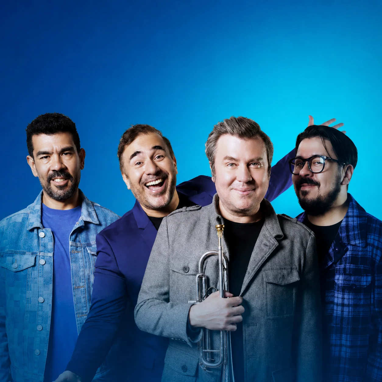 Los cuatro integrantes actuales de Malacates Trébol Shop, con Jacobo y su trompeta al frente.